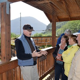 Tour guide telling stories to audience