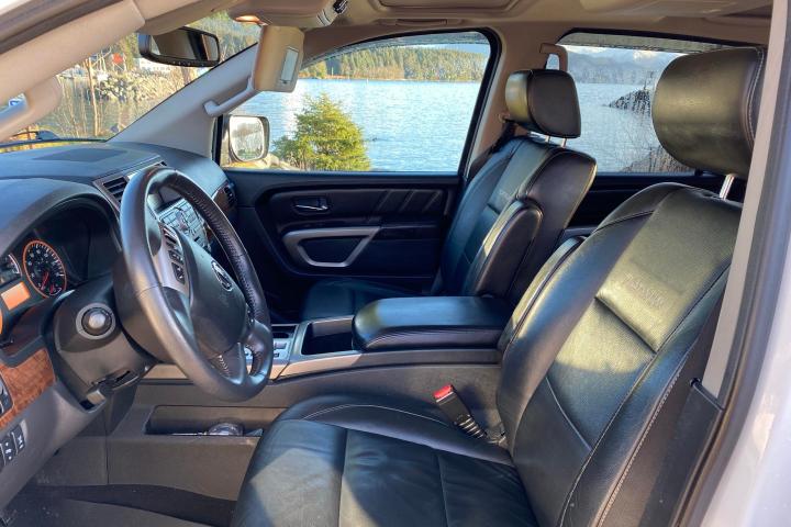 a motorcycle parked on the seat of a car